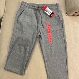 Brand-New Puma Joggers. Size is Medium. Color is Gray.